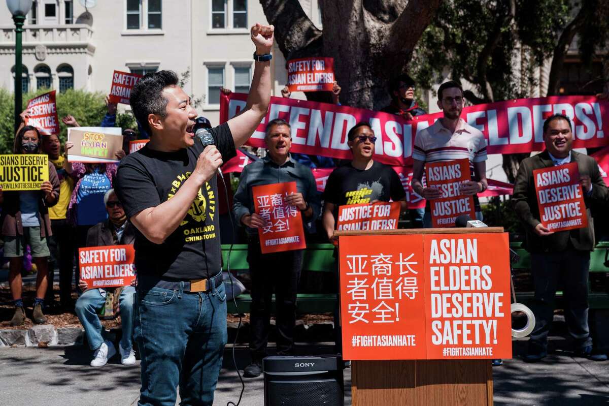 Charles Jung, of Asian Justice Movement, speaks at the Defend Asian Elders rally at Washington Square Park in San Francisco.