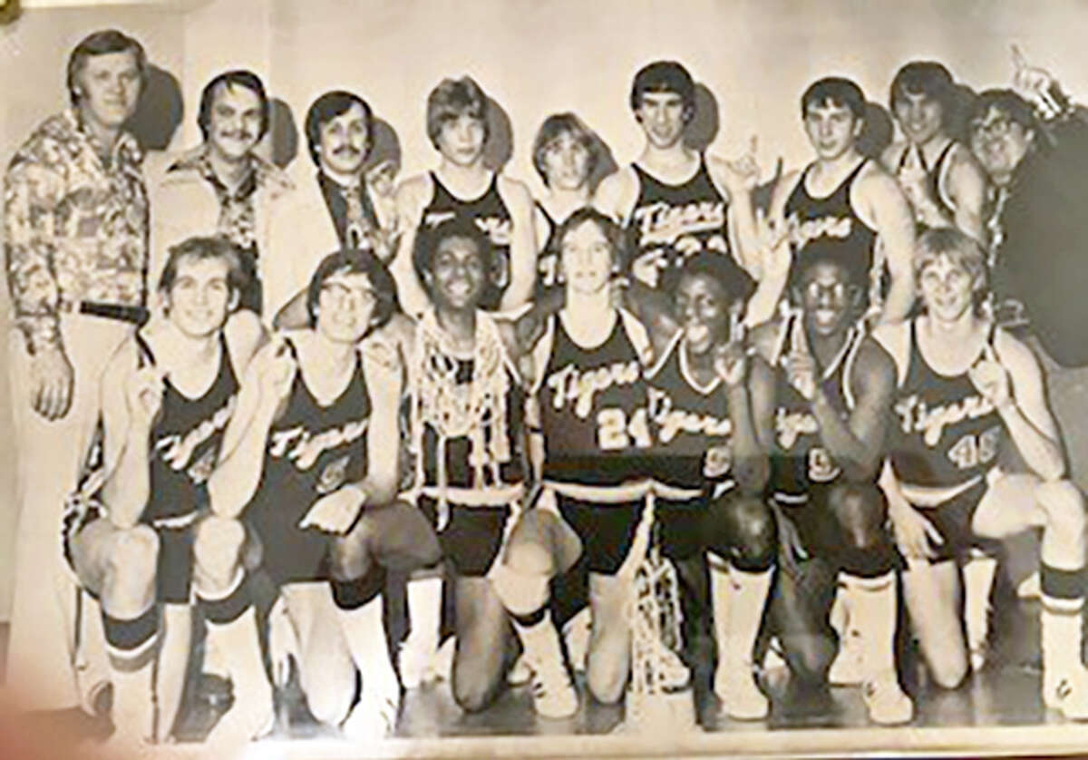 Former Edwardsville basketball coach Mel Roustio, back row left, with the 1975-76 EHS team, which reached the Sweet 16.