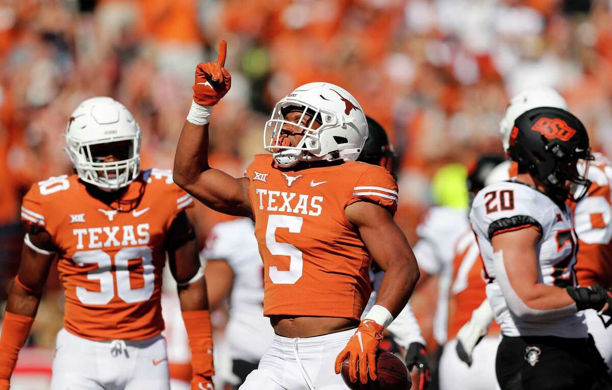 Bijan Robinson rushed for 1,127 yards and scored a total of 15 touchdowns last season, despite missing Texas’ final two games. He enters 2022 as a contender for the Heisman Trophy.