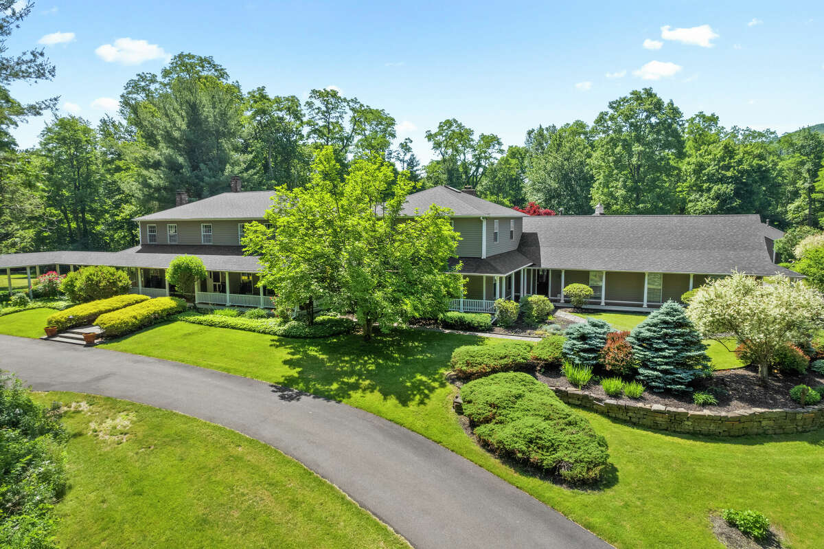 Sometimes you come across a listing that makes you think, “What doesn’t this home have?” At least that was my thought when looking at 512 Altamont Road, this 7,064-square-foot home in Voorheesville. Sure, you’ve got your bedrooms (five), bathrooms (four-and-a-half), a large kitchen, formal dining room and even an in-ground saltwater pool. But that kitchen also has a double oven and wine cooler. That pool comes with a pool house, complete with full bar, and other outdoor amenities include a large firepit and grill area with its own seating. Basketball hoop? This house does it one better with a full court. If you need to unwind, sit on the wraparound porch and take in the view of your eight acres. Fully finished, heated basement and three fireplaces. Five – count ‘em, five – garage spaces, and an extensive driveway to get you there. Central air, propane heating. Voorheesville Central School District. Taxes: $19,905. Listing price: $1.15 million. Contact broker Patrick McSharry, McSharry & Associates Realty, at 518-439-3547, patrick@mcsharryandassociates.com.  