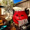 The Kool-Aid man on Poison Girl's back patio has a storied past.