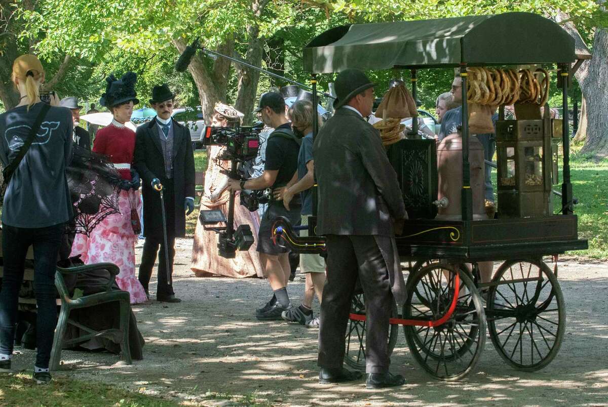 Actors are seen during the filming of the HBO series ‘The Gilded Age' in Washington Park on Monday, Aug. 8, 2022 in Albany, N.Y.
