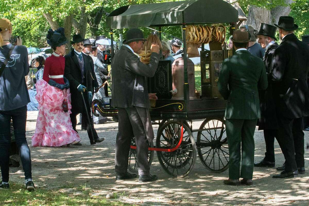 Actors are seen during the filming of the HBO series ‘The Gilded Age' in Washington Park on Monday, Aug. 8, 2022 in Albany, N.Y.
