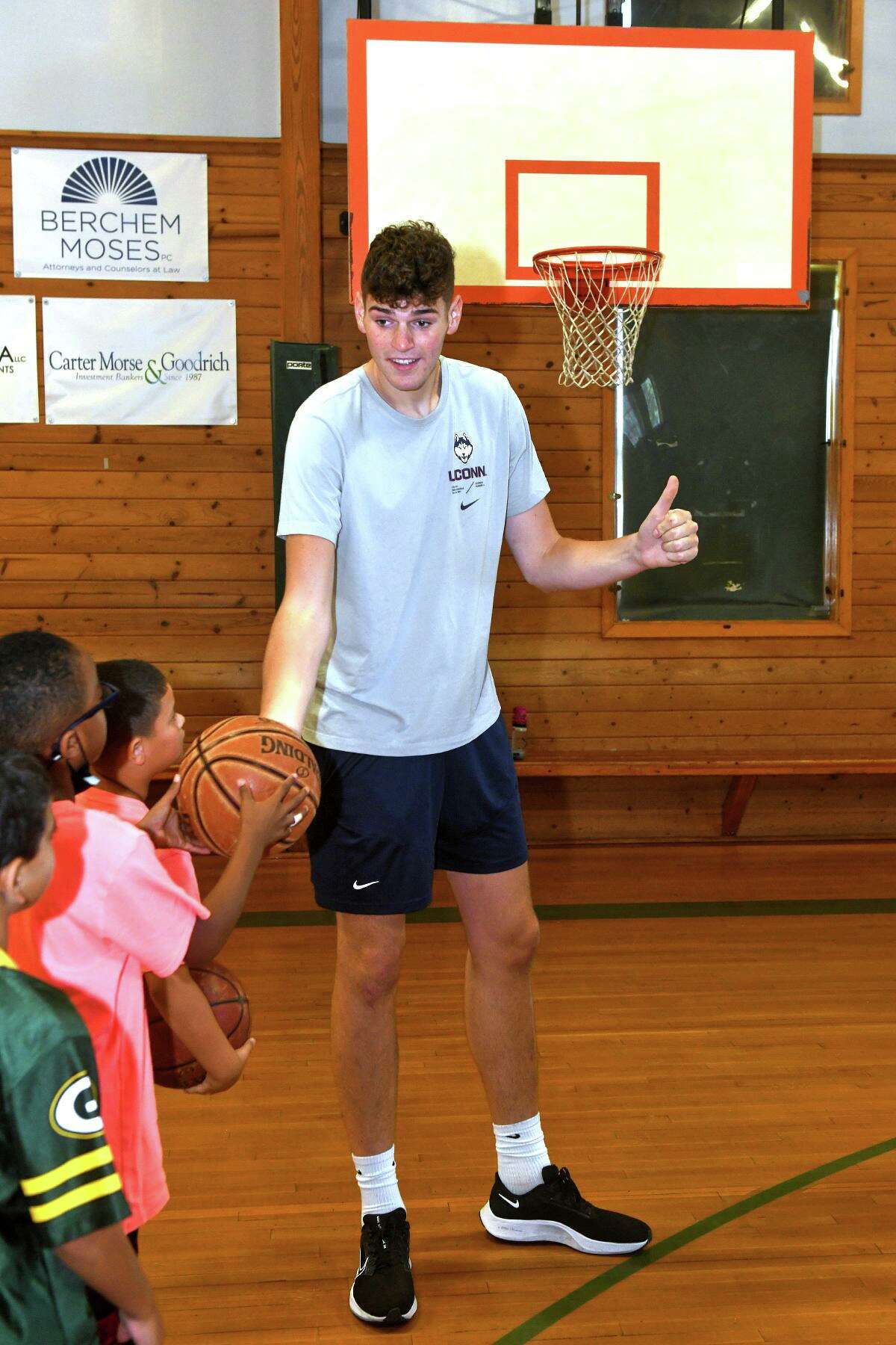UConn men’s basketball team captivates campers at Southport clinic