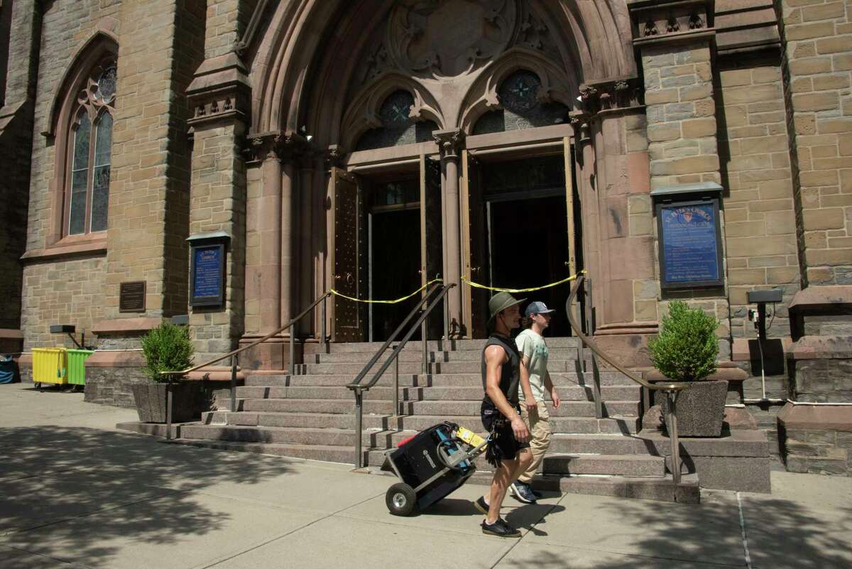 Crew is see outside St. Peter’s Episcopal Church on State and Lodge Streets for the filming of the HBO series ‘The Gilded Age' on Monday, Aug. 8, 2022 in Albany, N.Y.