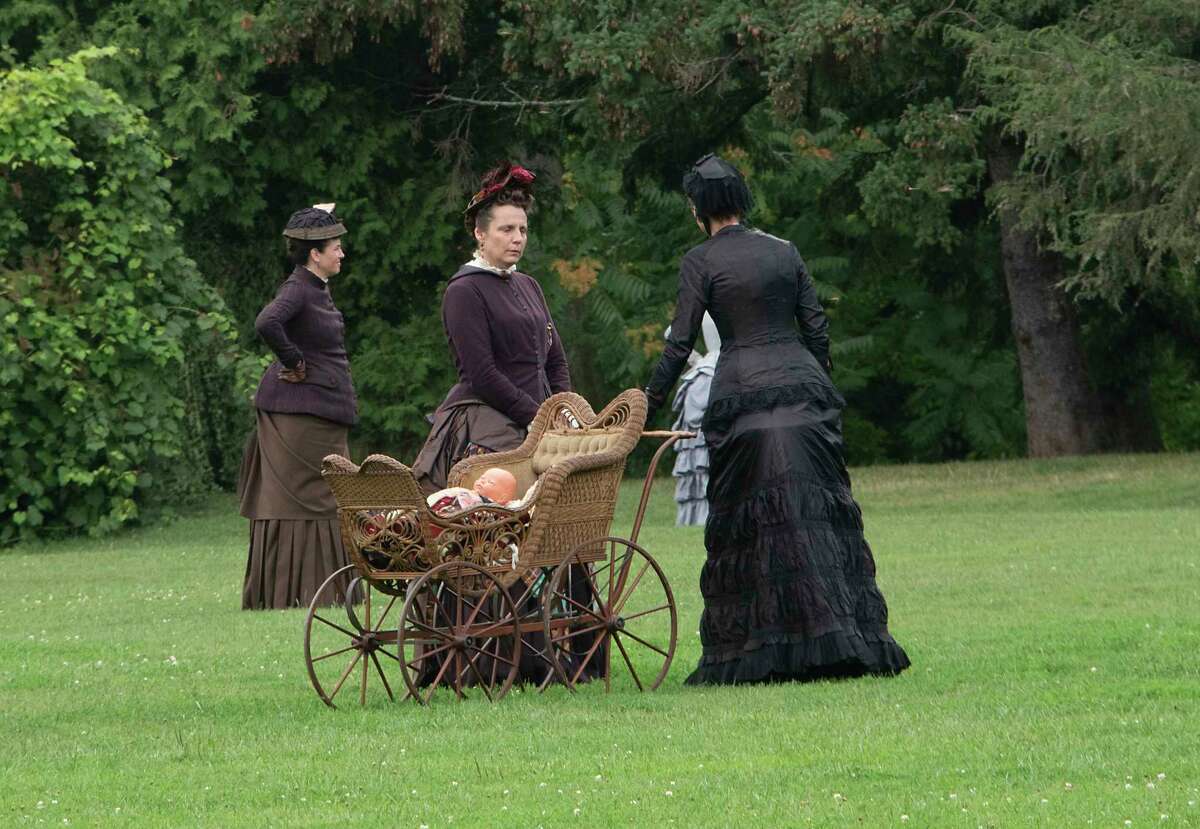 Actors are seen in what locals use as the dog park in Washington Park during the filming of the HBO series ‘The Gilded Age' on Monday, Aug. 8, 2022 in Albany, N.Y.