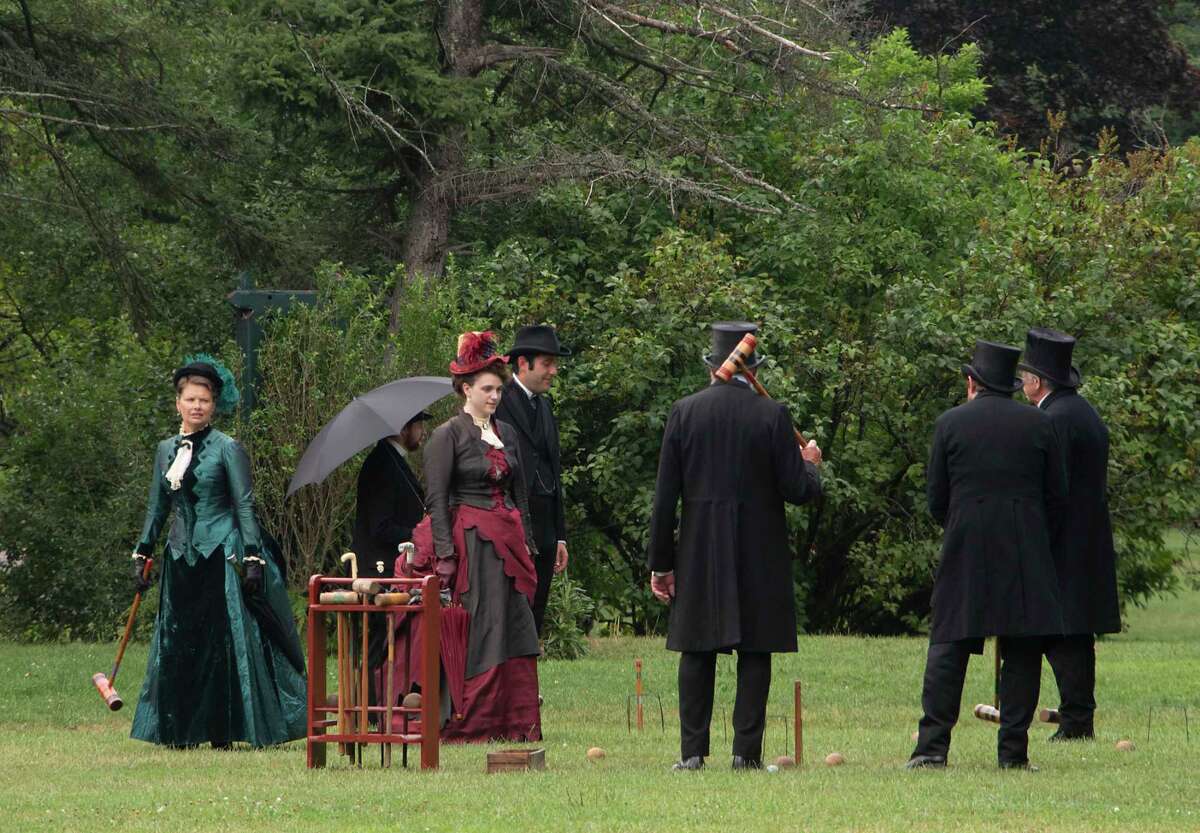 Actors are seen in what locals use as the dog park in Washington Park during the filming of the HBO series ‘The Gilded Age' on Monday, Aug. 8, 2022 in Albany, N.Y.