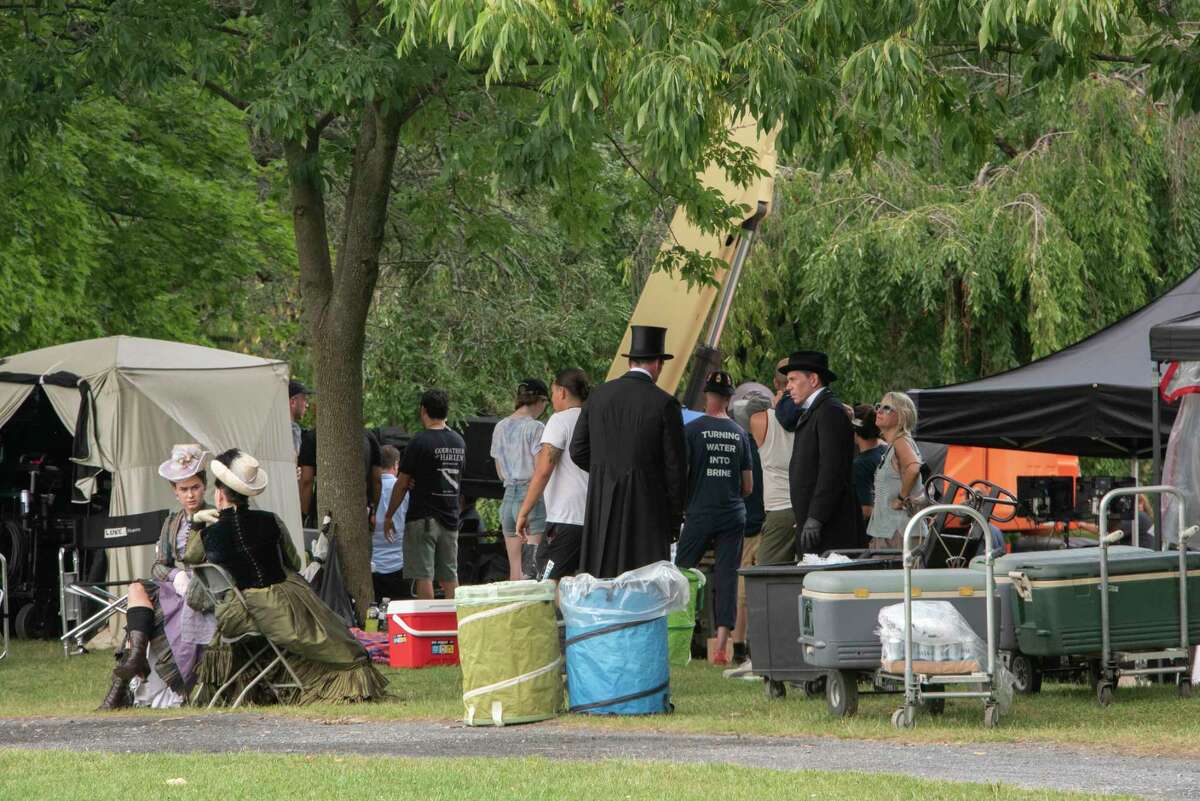 Crew and actors are seen in Washington Park during the filming of the HBO series ‘The Gilded Age' on Monday, Aug. 8, 2022 in Albany, N.Y.
