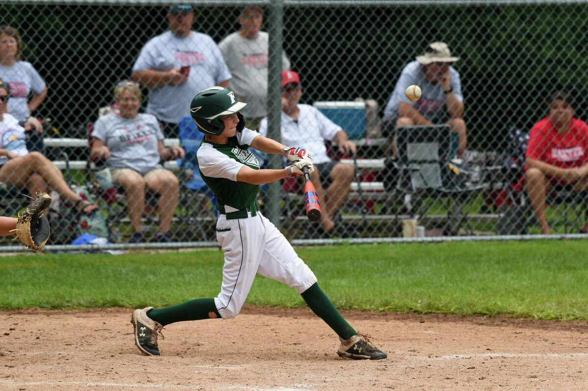 Freeland's Austin Hare drives the ball during Monday's game against Baxter, Kansas in the Junior League Baseball Central Region tournament at Larkin Township Park, Aug. 8. 2022. Hare went 3-for-3 with three RBIs in Wednesday's loss to Whitefish Bay, Wis.