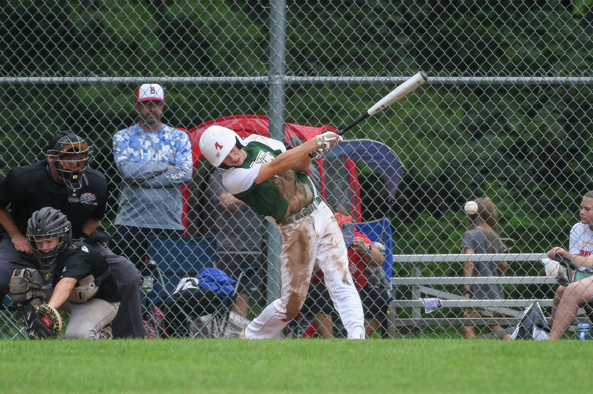 Freeland's Tucker Hileman gets a hit during Monday's game against Baxter, Kansas in the Junior League Baseball Central Region tournament at Larkin Township Park, Aug. 8. 2022.