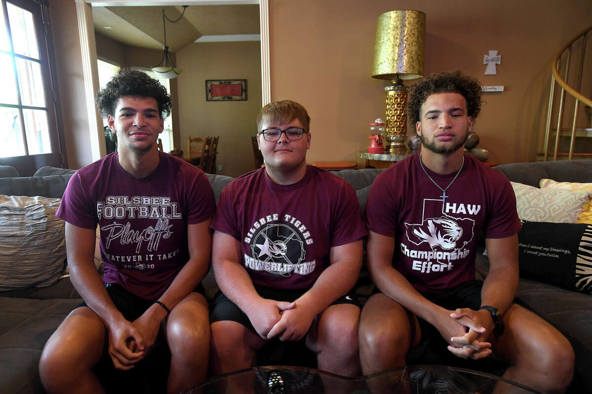From left, Maxwell Brisbane, Dominick Sposato and Mason Brisbane are more than brothers on the field for the Silsbee Tigers. The twins and Sposato are family at home, as well, after Sposato went to live with his teammates last year. Photo made Monday, August 8, 2022. Kim Brent/The Enterprise