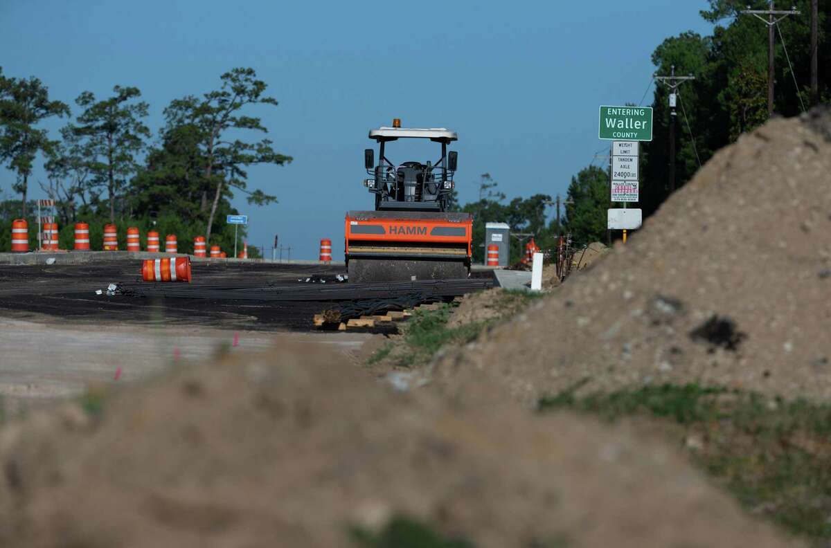 Crews are widening FM 1488 at Joseph Road in Waller County, shown Monday, Aug. 8, 2022, in Magnolia. A $202 million project would widen the last 20-mile segment of FM 1488 that is one lane in each direction from Montgomery County to Hempstead and convert it to a four-lane divided highway through Waller County.