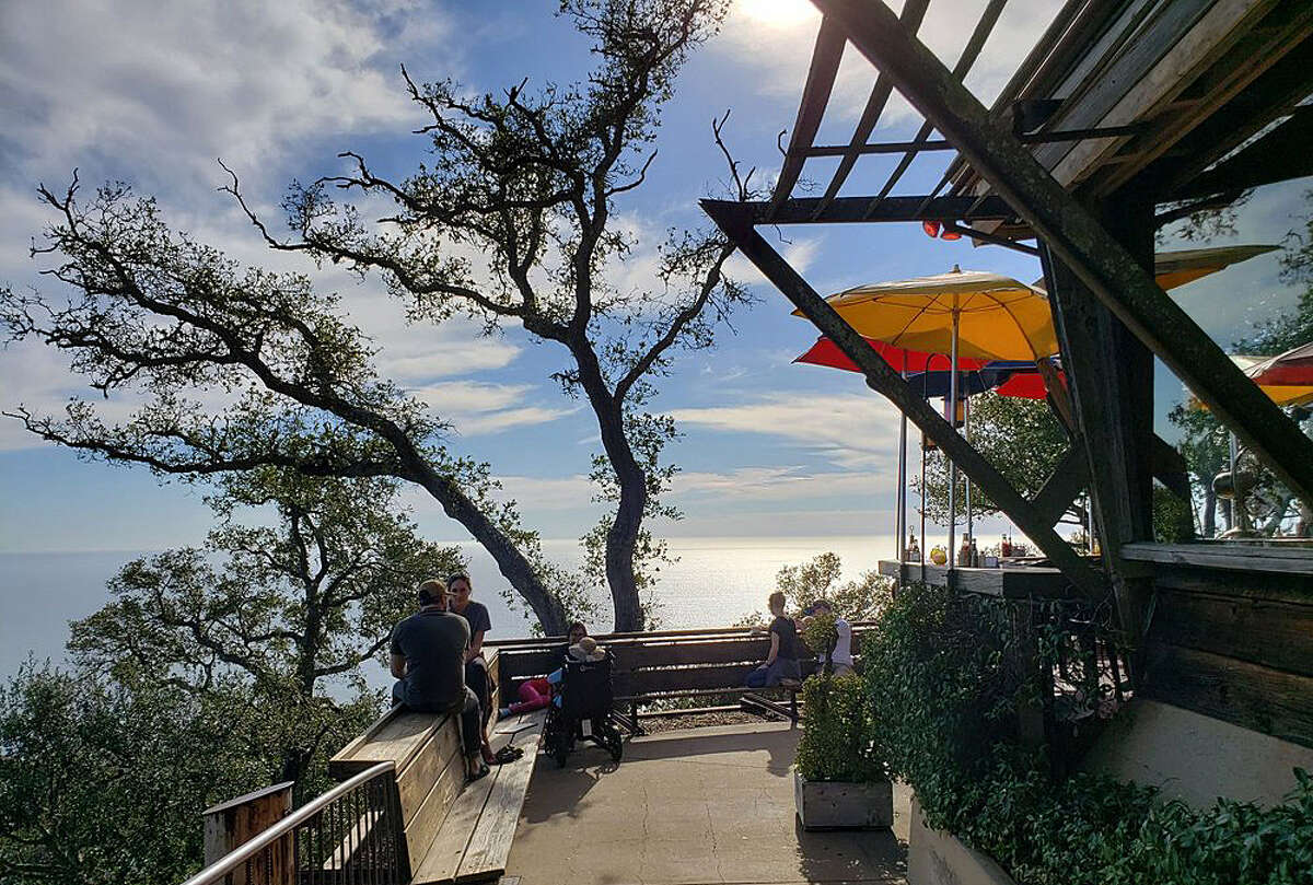 Ocean breezes come up the cliff side to greet visitors to Big Sur's Nepenthe. Since its opening in 1949, visitors have enjoyed the hideaway once owned by Orson Welles and Rita Hayworth. 