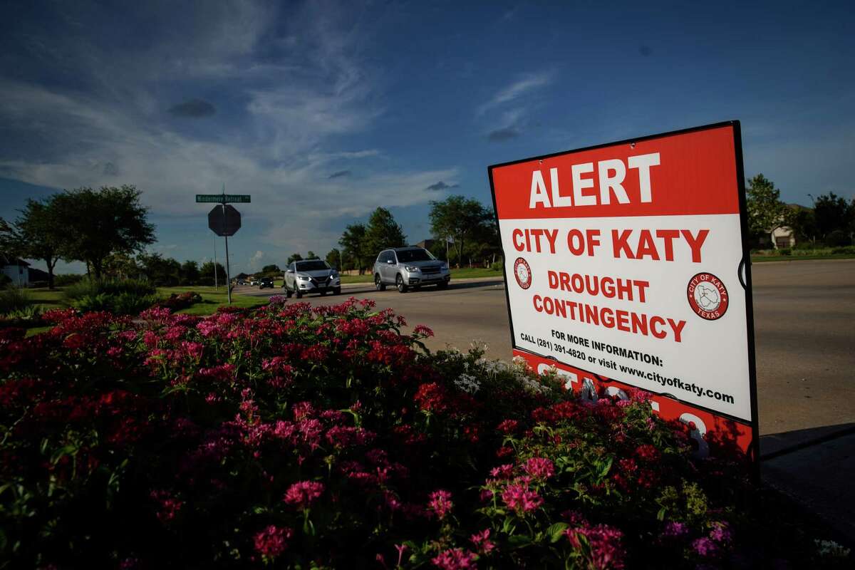 A sign alerts residents to water restrictions and drought information Monday, Aug. 8, 2022, in Katy.