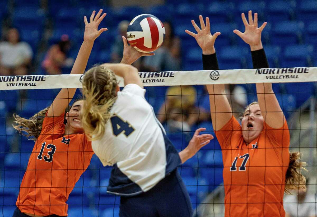 Brandeis' Sophia Kuyn, left, and Tessa Fontenot, right, defend Monday, August 8, 2022 against a shot from O'Connor's Kendall McKee during the Broncos' game against the Panthers at Northside Sports Gym.
