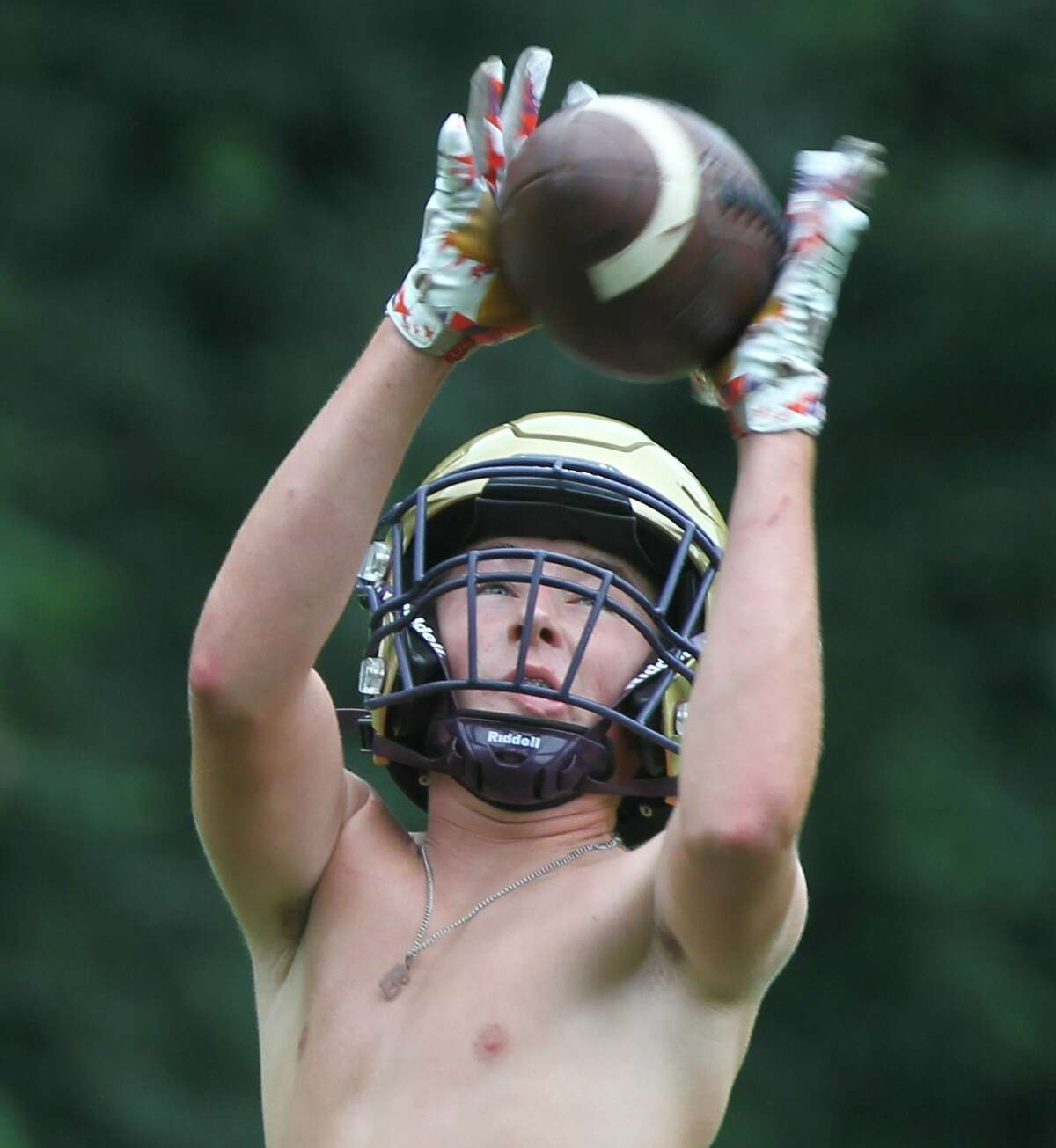 Routt's Declan Lahey catches a pass on Day 1 of high school football practice Monday in Jacksonville.