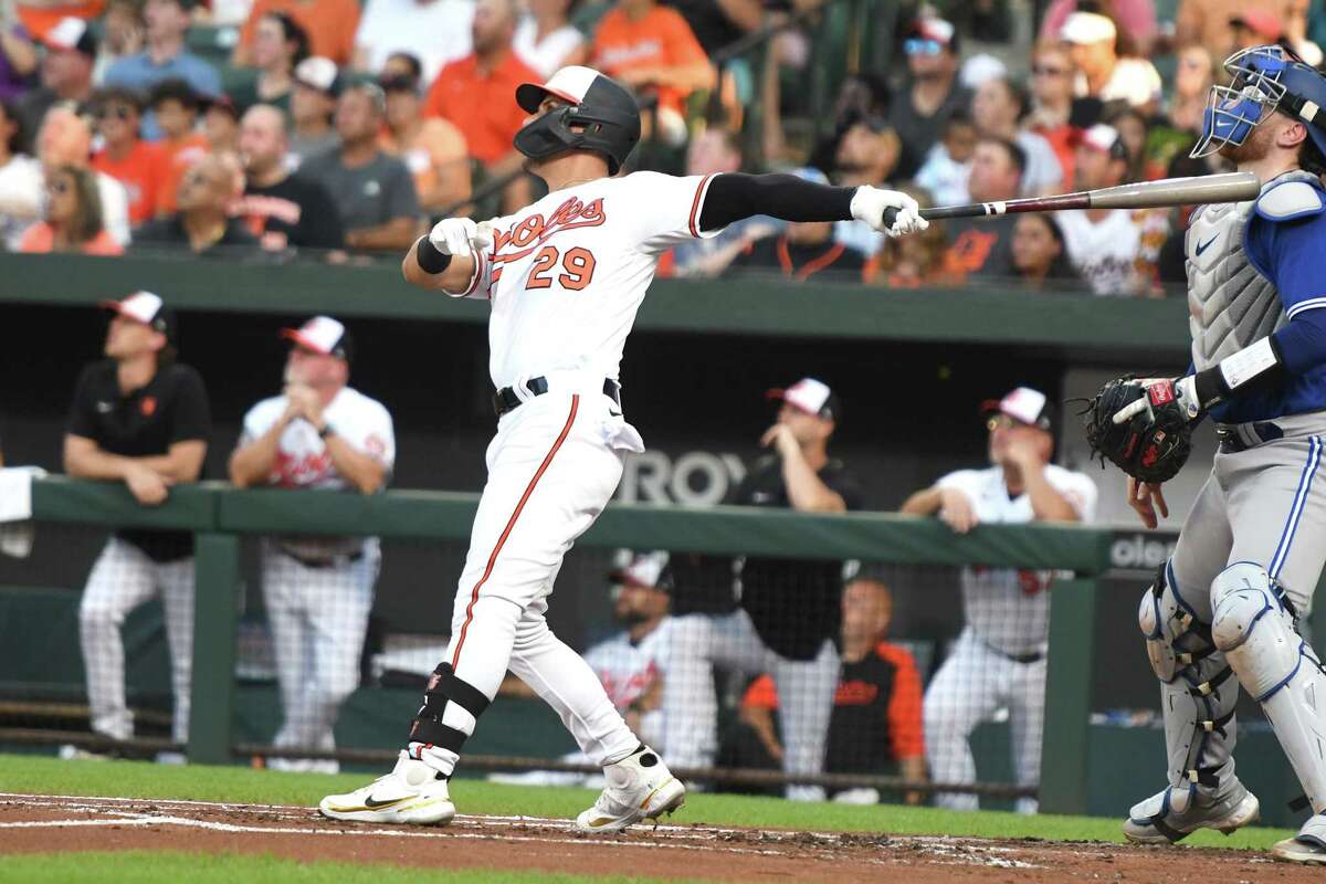 BALTIMORE, MD - AUGUST 08: Ramon Urias #29 of the Baltimore Orioles hits a three run home run in the first inning during a baseball game against the Toronto Blue Jays at Oriole Park at Camden Yards on August 8, 2022 in Baltimore, Maryland. (Photo by Mitchell Layton/Getty Images)