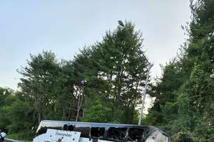Officials: Driver escaped burning coach bus in Shelton