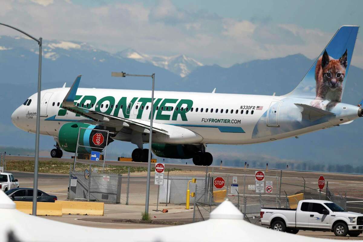 FILE - In this June 10, 2020 file photo, a Frontier Airlines jet heads down a runway for take off from Denver International Airport as travelers deal with the effects of the new coronavirus in Denver. Frontier Airlines says its hopes to gross about $630 million by selling some of its stock to the public. The discount airline said in a regulatory filing Tuesday, March 23, 2021, that it expects to sell 30 million shares at between $19 and $21 per share. (AP Photo/David Zalubowski, File)
