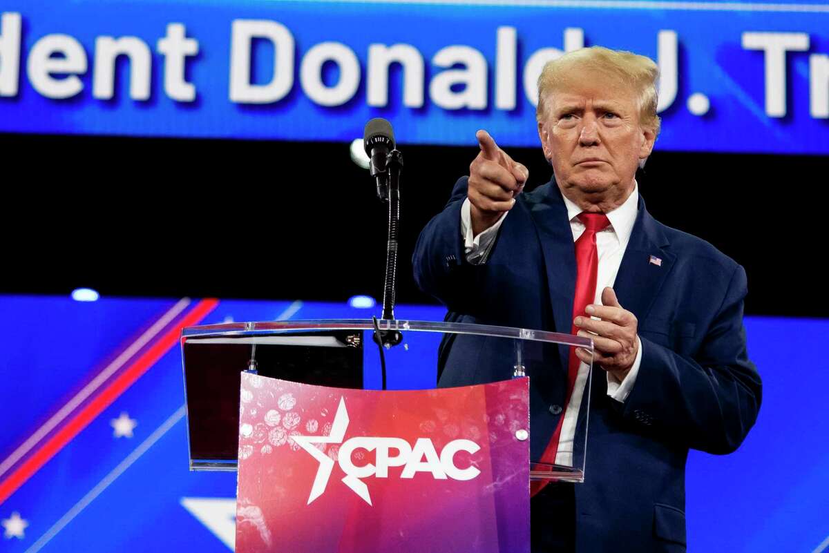 Former President Donald Trump takes the stage during the Conservative Political Action Conference at the Hilton Anatole in Dallas on Saturday, Aug. 6, 2022. (Emil Lippe/The New York Times)