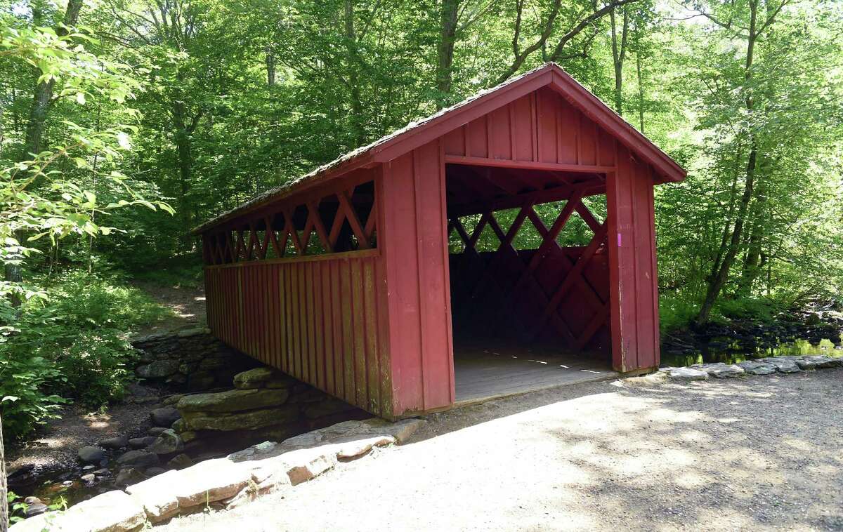 The covered bridge in Chatfield Hollow State Park in Killingworth photographed on June 30, 2021. State authorities have closed the park’s swimming area Tuesday, Aug. 9, 2022, following water quality tests.