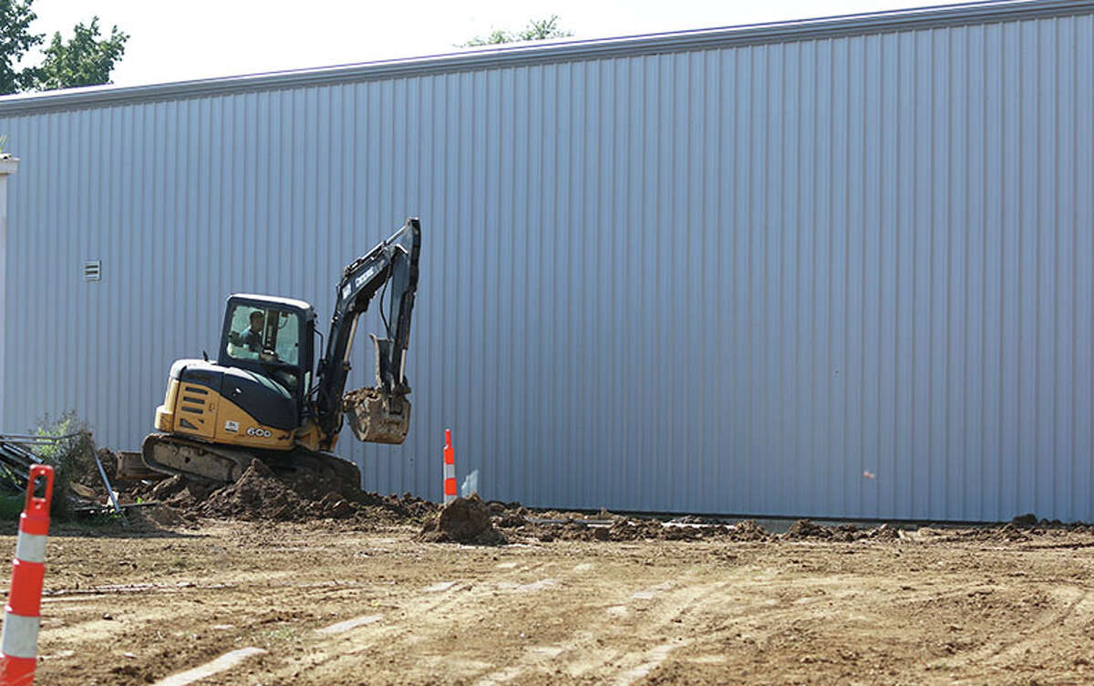 Work continues outside the new on-campus building constructed for CM Eagles wrestling in Bethalto.