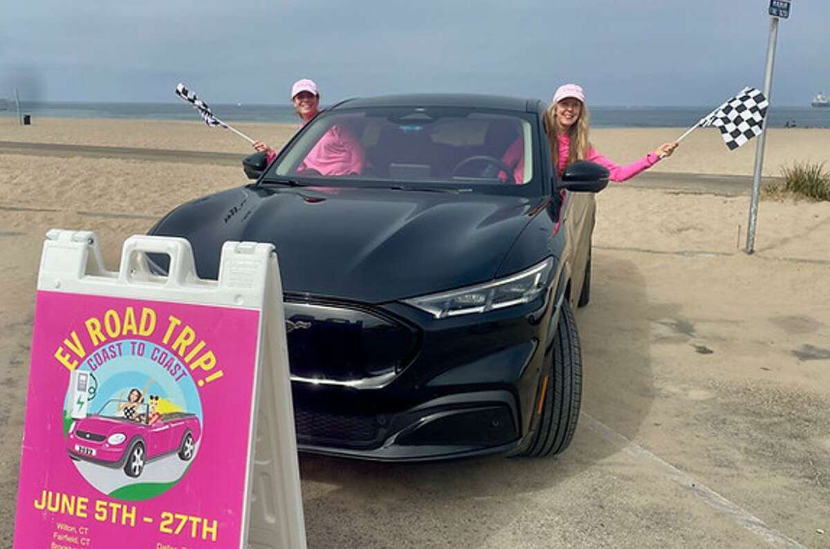 Live Green Executive Director and Co-founder Daphne Dixon, right, and EV Program Manager Alyssa Murphy after arriving in Los Angeles, Calif. on their electric vehicle road trip.