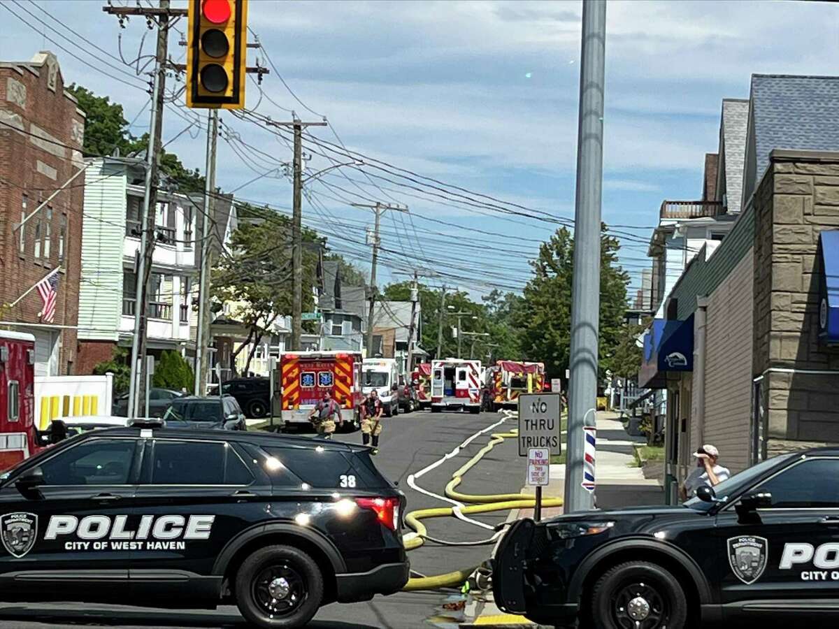 West Haven firefighters and police responded to a reported fire at a home on Admiral Street Tuesday morning, Aug. 9, 2022.