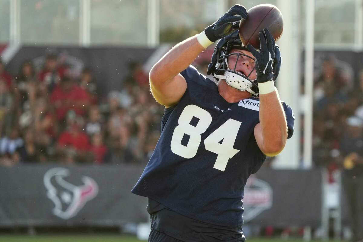 Houston Texans tight end Teagan Quitoriano makes a catch during an NFL training camp Tuesday, Aug. 9, 2022, in Houston.