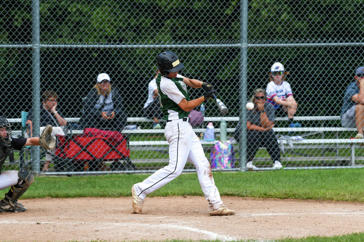 Freeland's Connor Lasceski makes contact during Tuesday's game against Jasper, Ind. in the Junior League Baseball Central Region tournament at Larkin Township Park, Aug. 9, 2022. Lasceski had a grand slam homer and five RBIs in Wednesday's loss to Whitefish Bay, Wis.