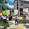 About 35 people participated in a protest against the Michigan Chamber of Commerce on Tuesday, Aug. 9, 2022 in Lansing, along Walnut and West St. Joseph Streets in Lansing.