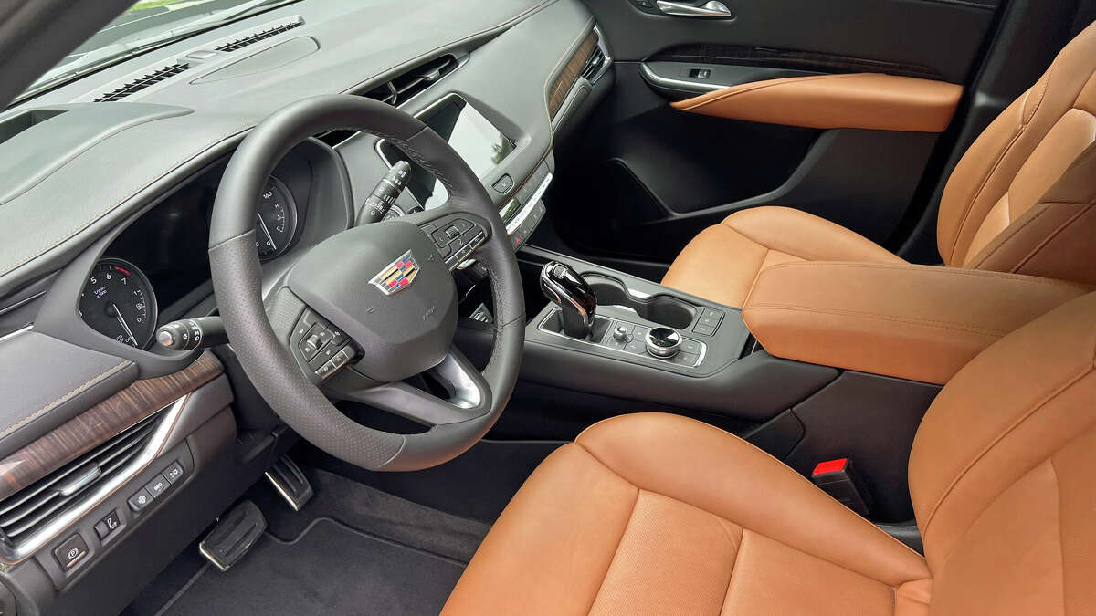 There is room for up to five people in the Cadillac XT4 small crossover utility vehicle, shown here in the Sport model with optional leather seating.