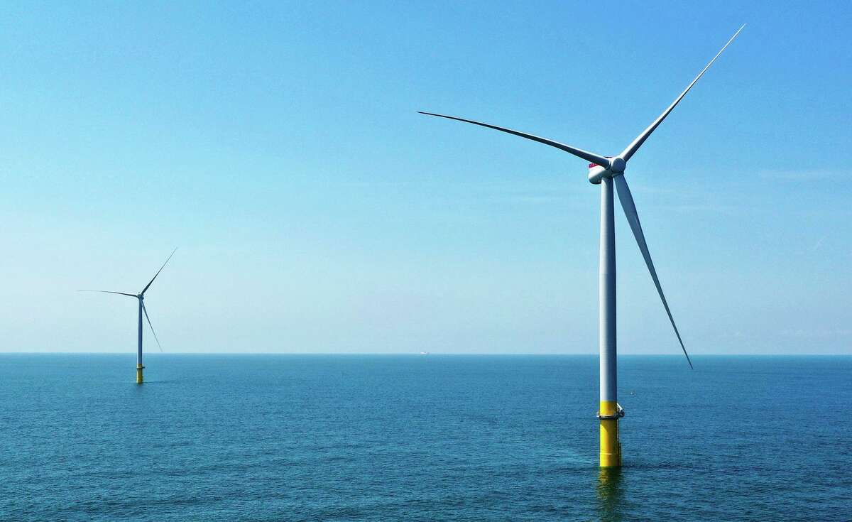 Two offshore wind turbines are seen off the coast of Virginia. Offshore wind farms do not yet exist in California, but the state has big plans for the industry.
