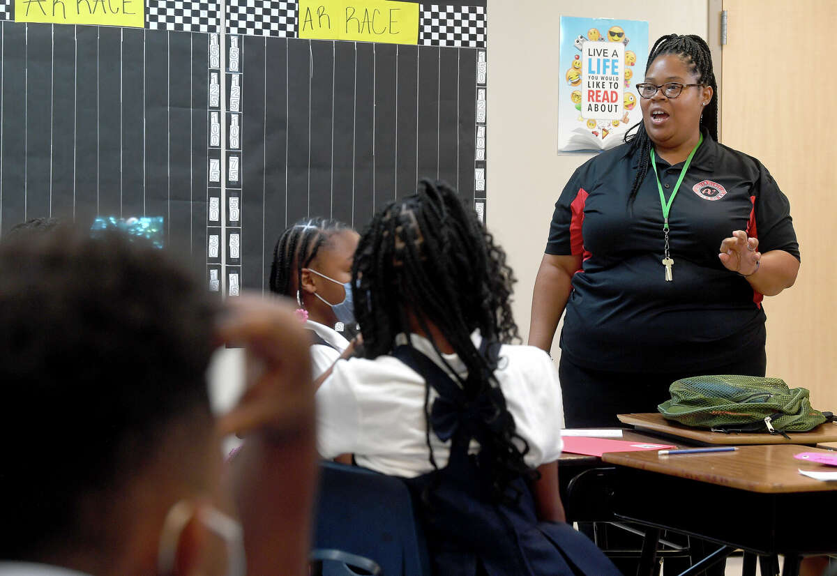 Debra Johnson leads her fourth graders in an activity to learn more about their classmates on the first day of school at DeQueen Elementary in Port Arthur. Photo made Wednesday, August 10, 2022. Kim Brent/The Enterprise