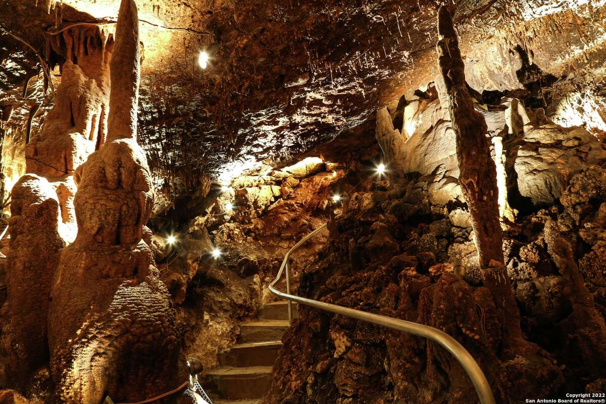 The owners of this property are living it up underground at this home with its own cavern. 