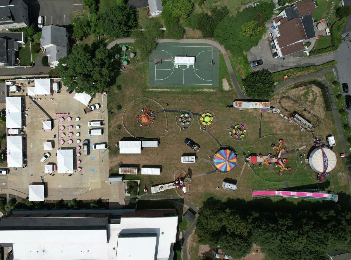 Setup for the St. Roch's Feast continues at St. Roch Church and Hamilton Avenue School in the Chickahominy section of Greenwich, Conn. Wednesday, Aug. 10, 2022.