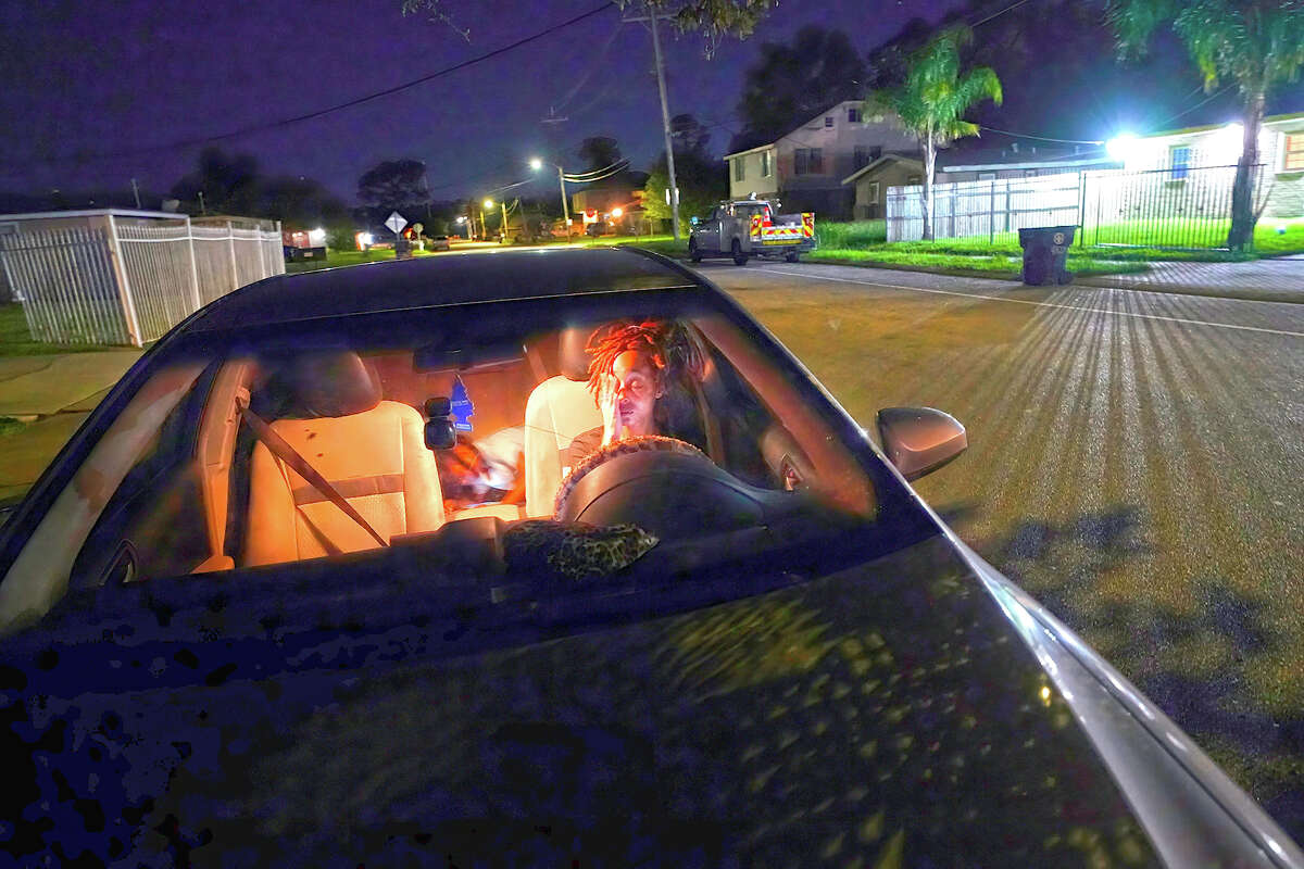 Jada Riley sits in her car at night with her son Jayden Harris, 6, as she contemplates where she might spend the night. "I've slept outside for a whole year before. It's very depressing, I'm not going to lie," said Riley, who often doesn't have enough money to buy gas or afford food every day. "I don't want to have my son experience any struggles that I went through."