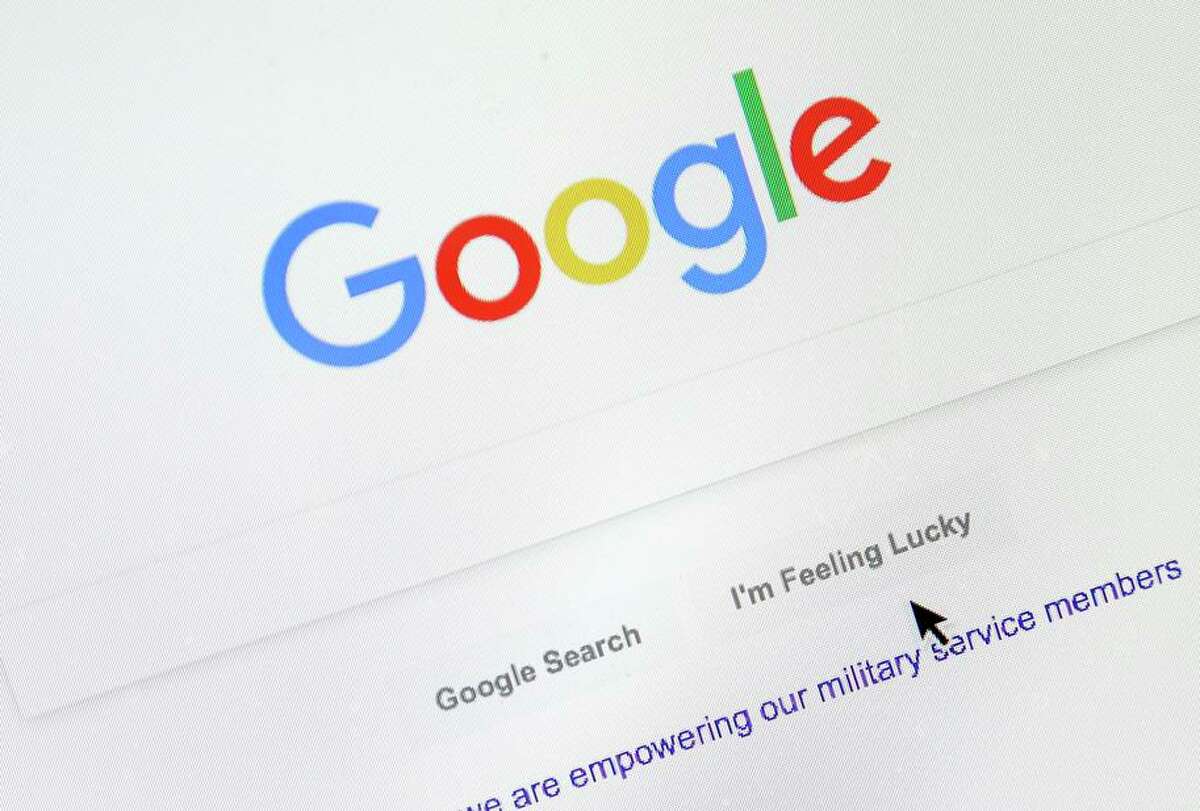 A cursor moves over Google’s search engine page. The company has announced changes to its search results.