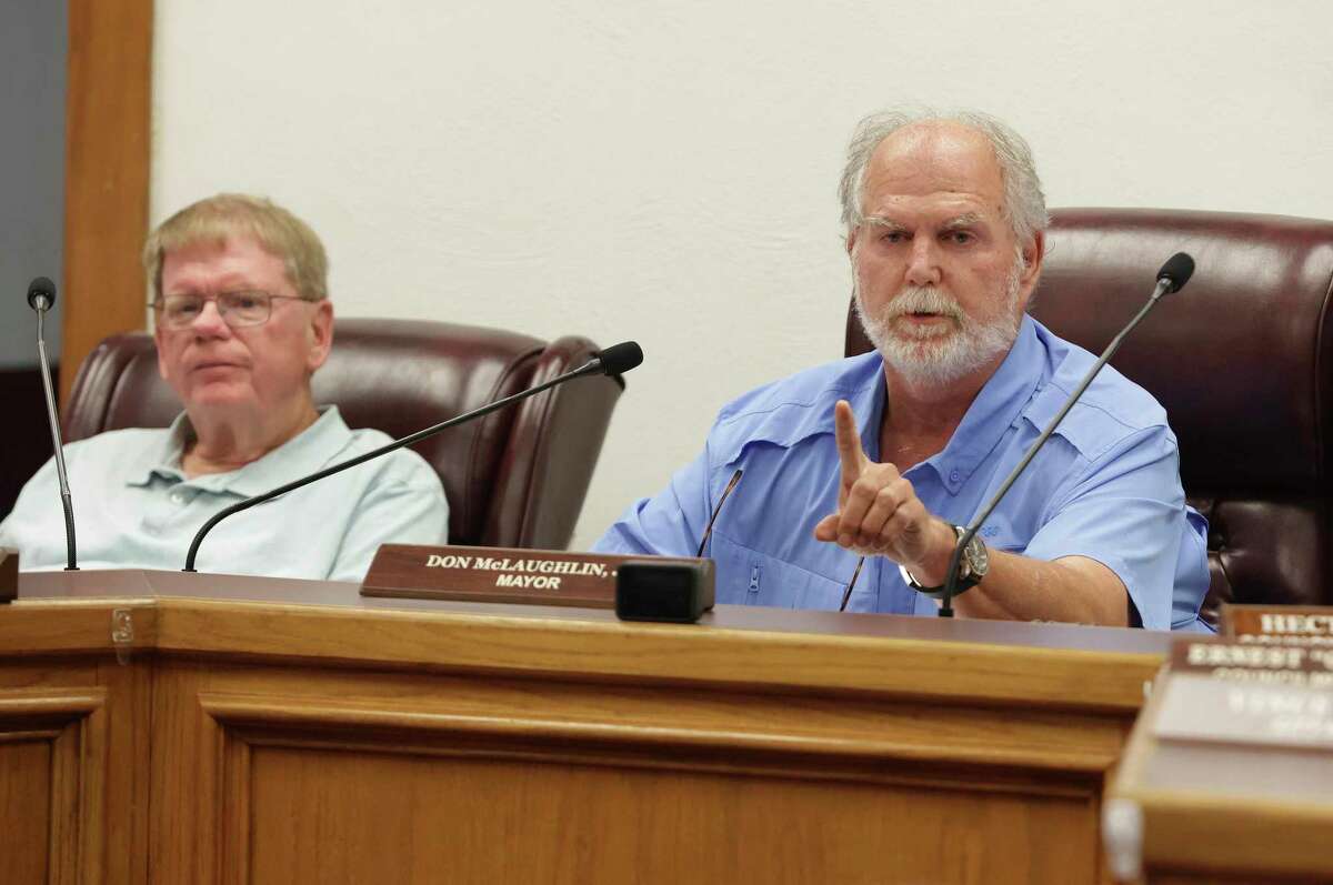 Mayor Don McLaughlin (center) warns a group in the audience to keep decorum or they would be escorted out of the Uvalde City Council meeting Tuesday.
