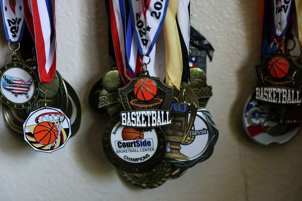Elite basketball player King Tari Johnson’s, 8 medal collection at his home in Stockton, Calif., on Friday, July 29, 2022. King Tari is the eighth-ranked 8-year-old basketball player in the nation.