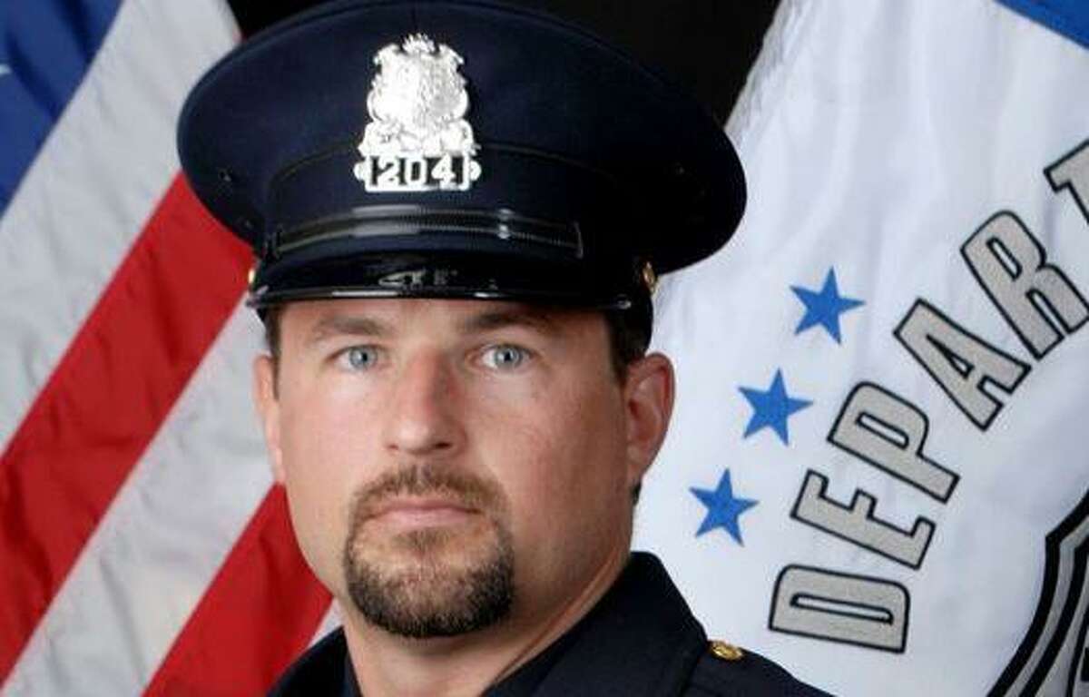 Greenwich Police Officer Robert Smurlo retired after a 20-year-career.
