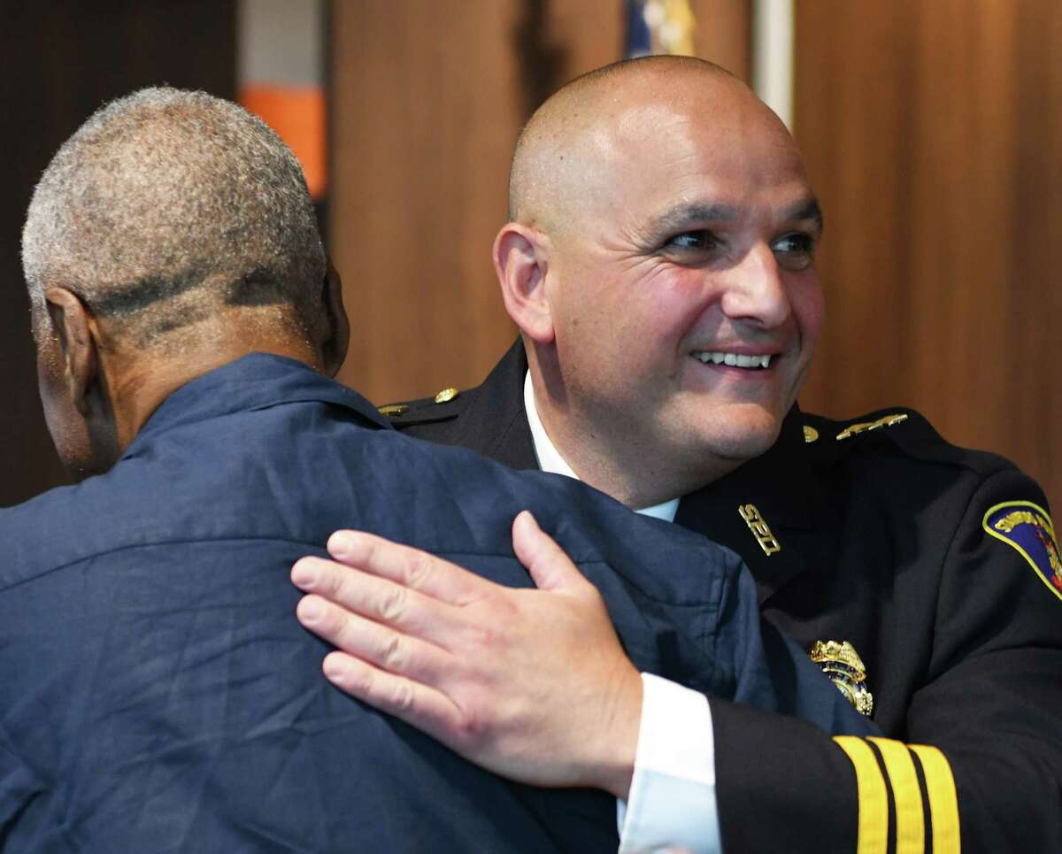 Louis DeRubeis receives congratulations after being promoted to assistant chief at the Stamford Police Department in 2021. DeRubeis has just been named Stamford’s Director of Public Safety.