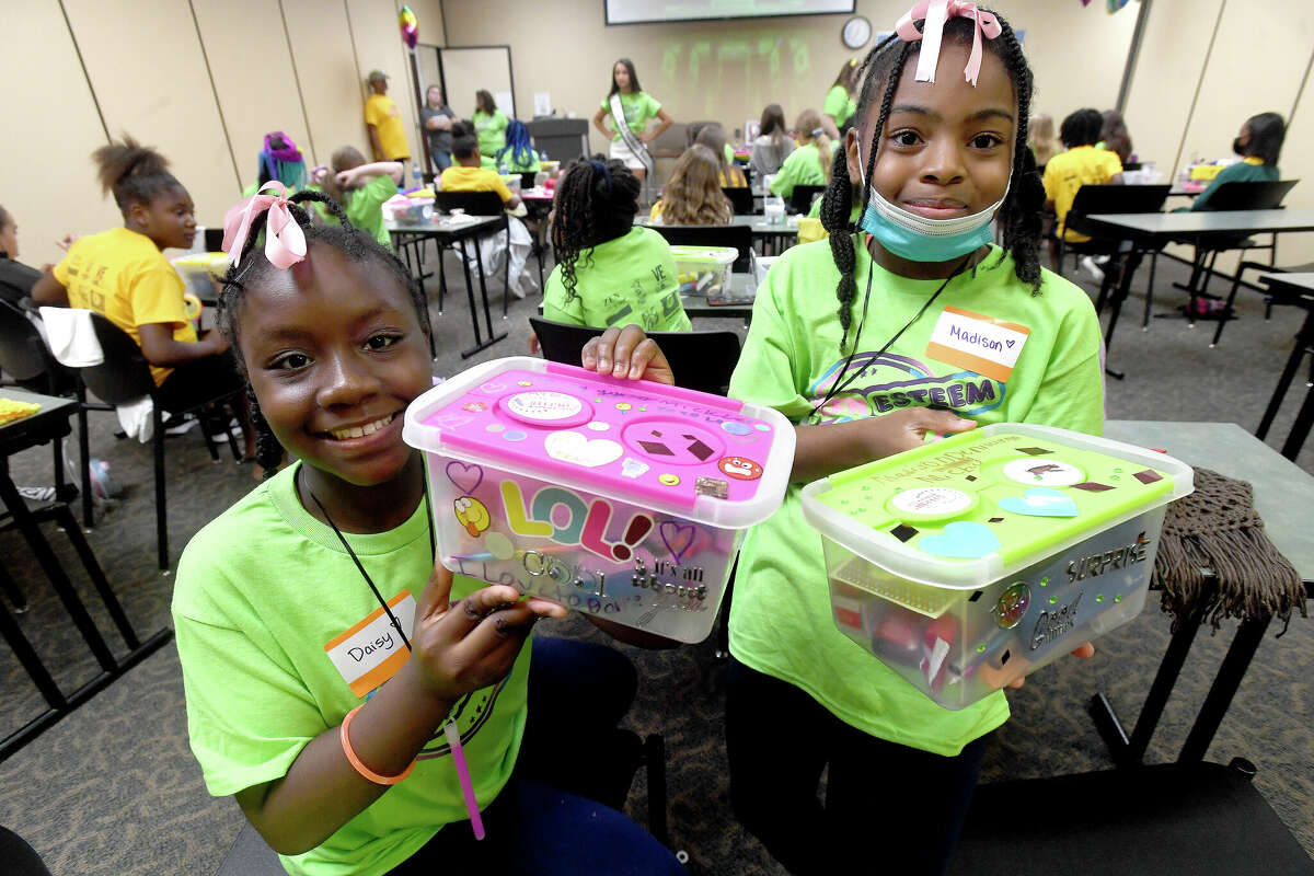 Sisters Daisy and Madison Mickles show their creativity during the Tween Esteem Camp Saturday at the Medical Center of Southeast Texas in Port Arthur. Photo made Saturday, July 30, 2022. Kim Brent/The Enterprise