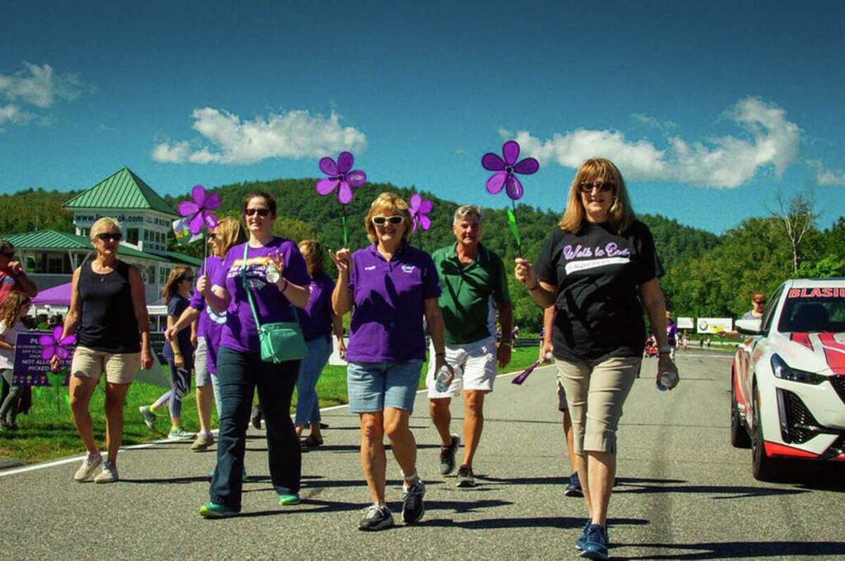 Clutching colorful spinning flowers in hand, area residents gathered at Lime Rock Park in Lakeville, CT, last fall to join the fight against Alzheimer's at the 2021 Northwestern Walk to End Alzheimer's. A similar walk will be held in New Milford in September.