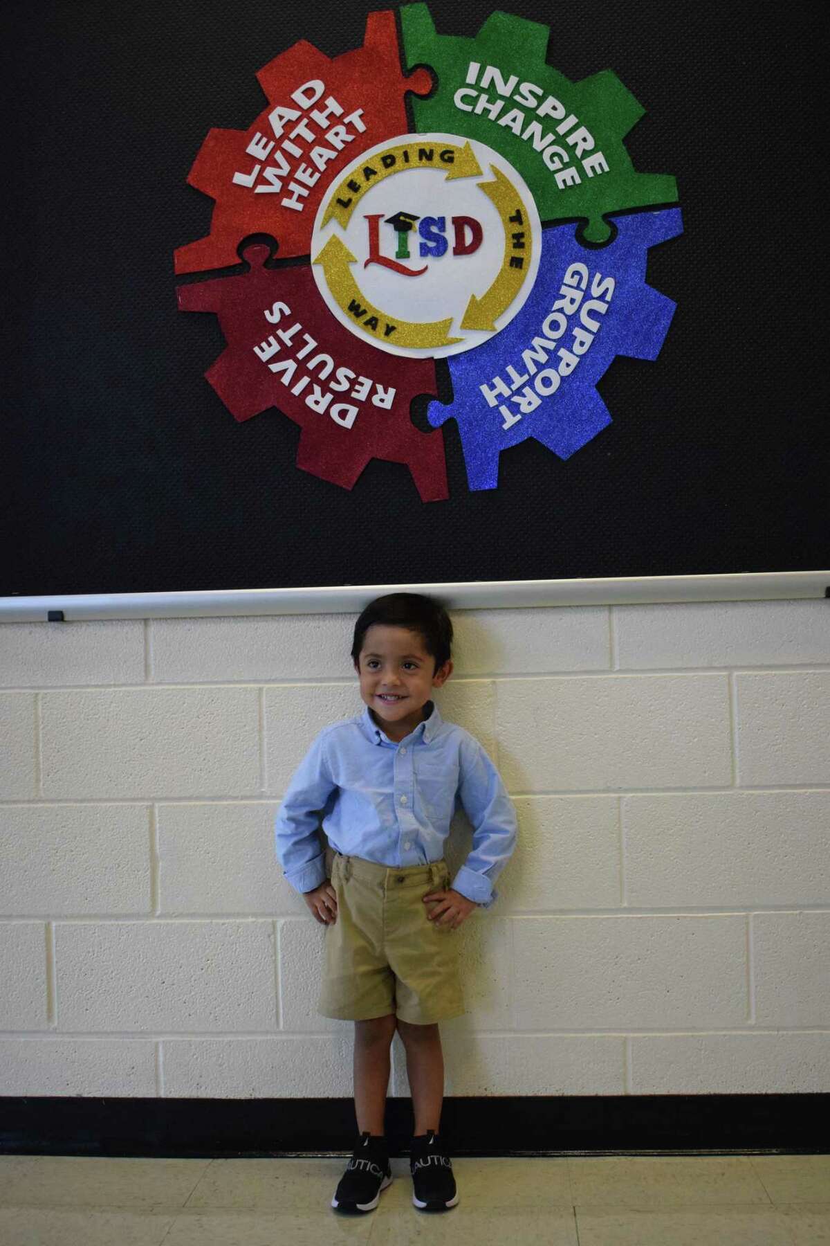 Pictured is Luca, a pre-K3 student excited to begin his first day ever in school at MacDonnell Elementary School.