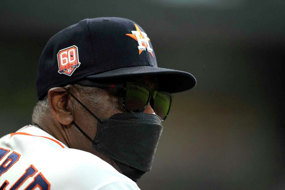 Astros manager Dusty Baker was back in the dugout Thursday after missing five games with a mild case of COVID-19.
