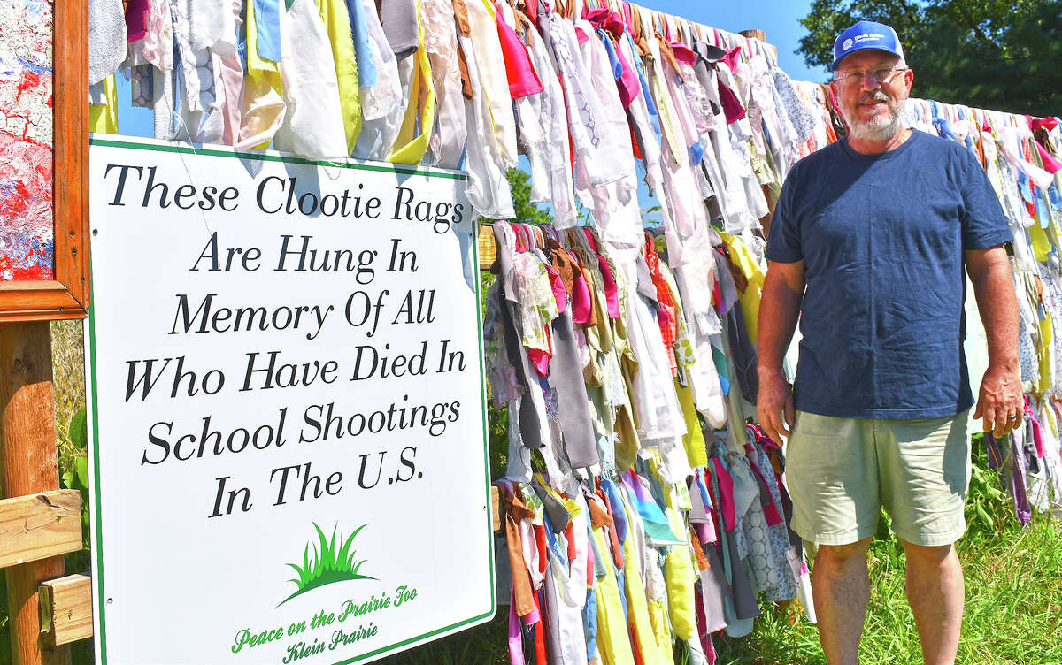 Kevin Klein has created a Clootie Wall at the edge of his property along Happy Hollow Road in Murrayville to honor all those who have died in school shootings.
