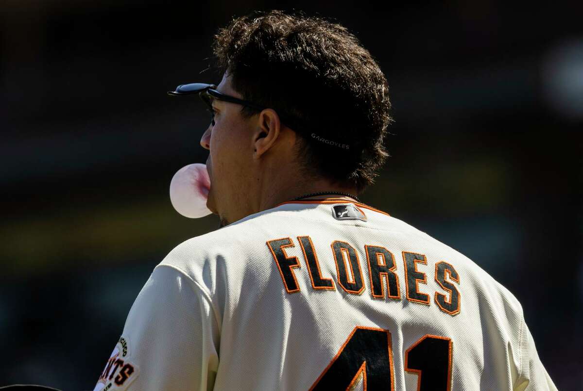 Why is the Giants' clubhouse full of Wilmer Flores fans? 'Flo is cool