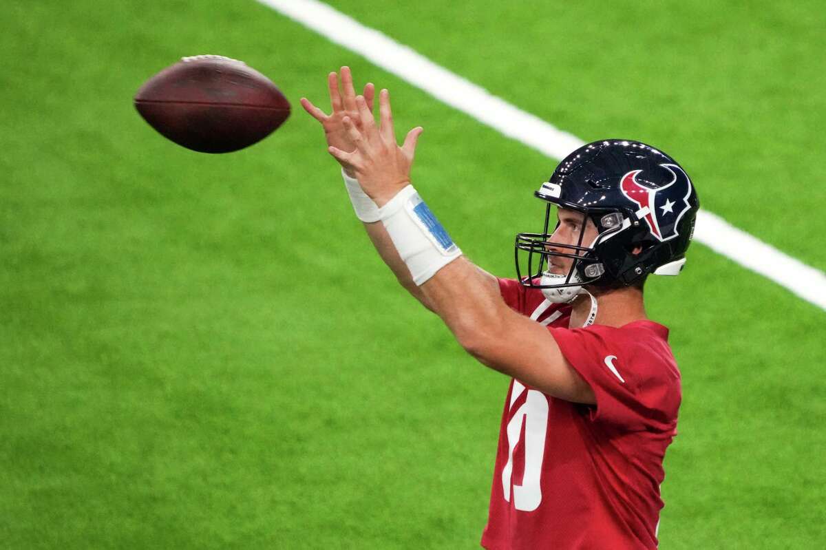 Houston Texans quarterback Davis Mills (10) gets ready for an NFL training camp practice inside NRG Stadium Thursday, Aug. 11, 2022, in Houston.