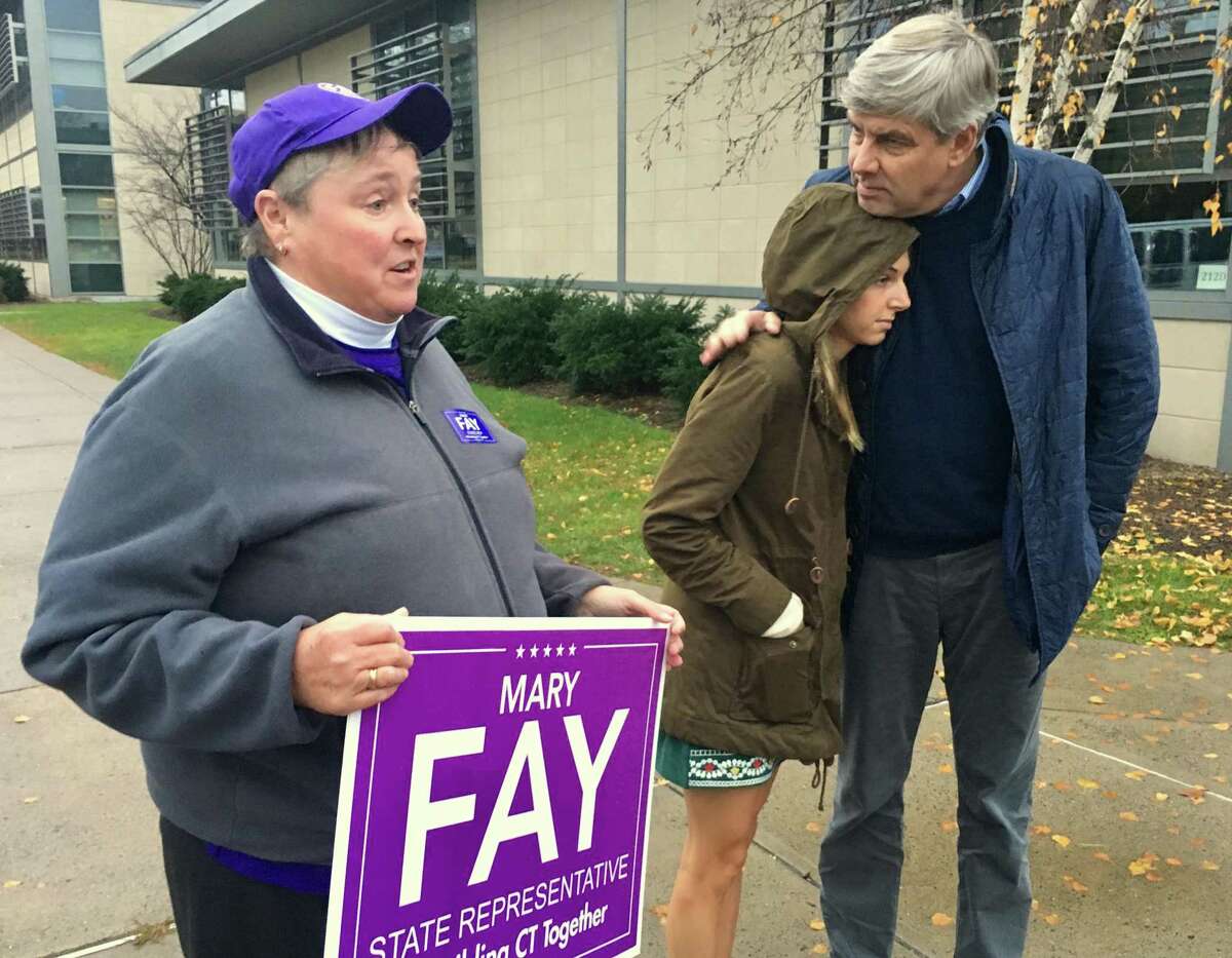 Mary Fay, left, of West Hartford, the Republican nominee for state comptroller, is the only candidate for statewide office from either party who comes from greater Hartford. She is shown in West Hartford on Election Day 2018, when she ran for state Representative, with Bob Stefanowski, then and now the GOP nominee for governor. Stefanowski is with one of his daughters.